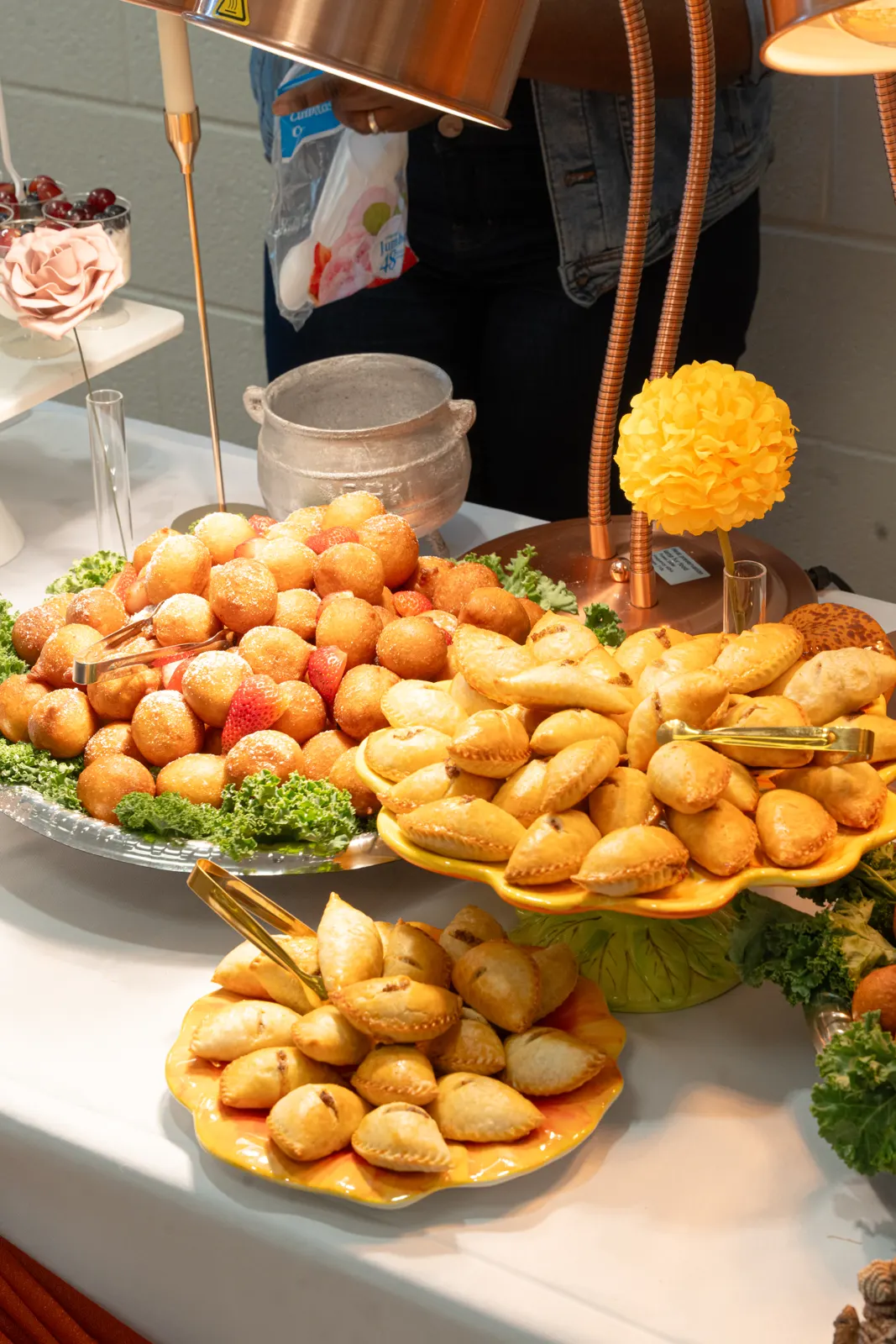 Platters of golden pastries and fresh fruit at a TFL event